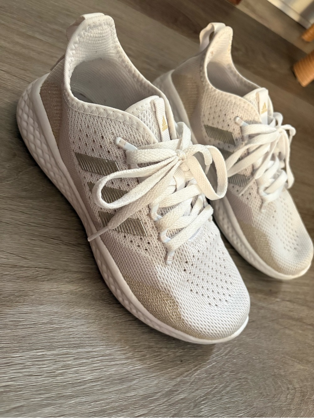 adidas Women's White Knit Lace-Up Running Sneakers with Subtle Gold Accents